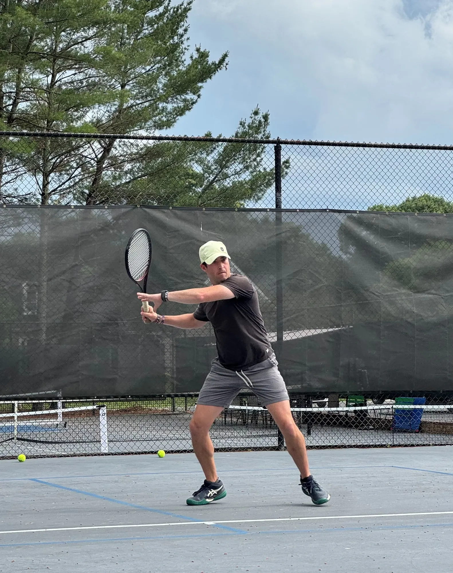 Nick John, Teaching Professional at DeMartini Tennis, in his coach portrait.