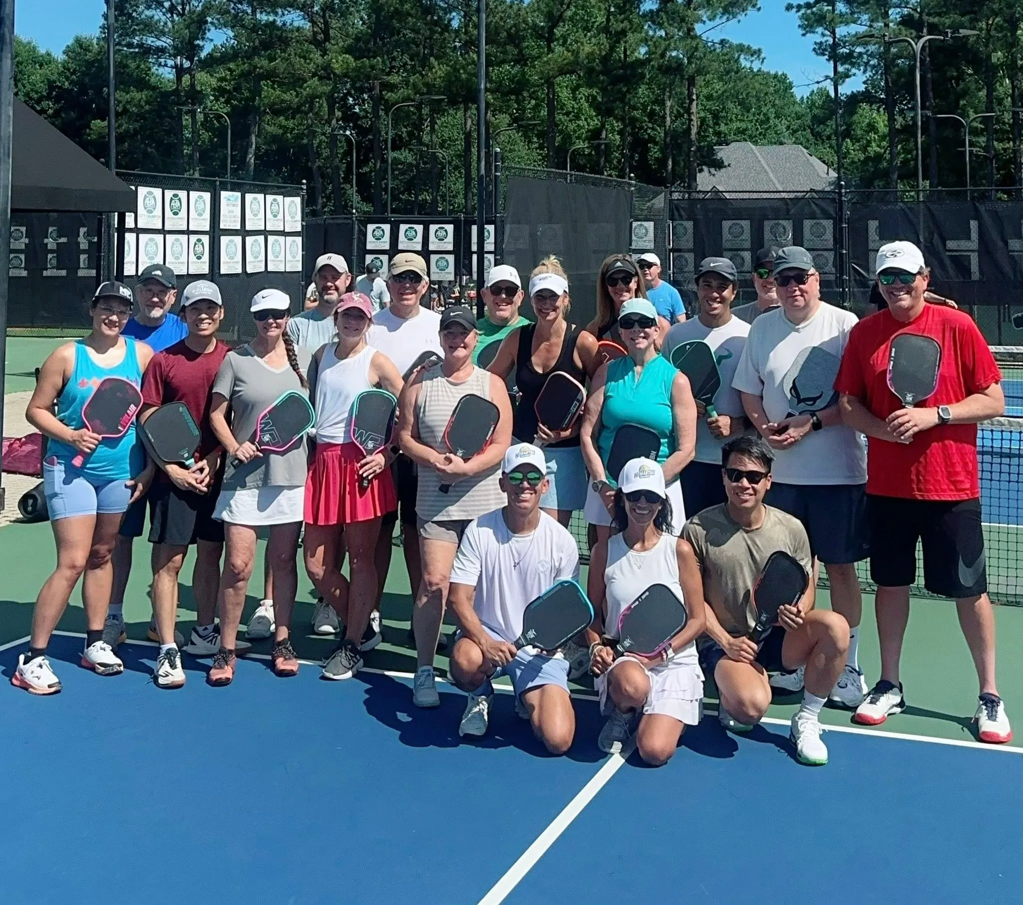 An adult pickleball clinic on the Crooked Creek pickleball courts